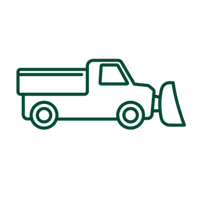 United Land Services snow plow clearing a commercial parking lot after a heavy snowfall